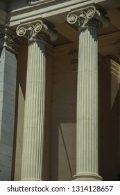 Close-up Of Elegant Columns With Ionic Capitals On The West Facade Of Casón Del Buen Retiro, In A Sunny Day At Madrid. Capital Of Spain This Charming Metropolis Has Vibrant And Intense Cultural Life.