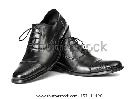 Close-up of elegant men shoes on white background