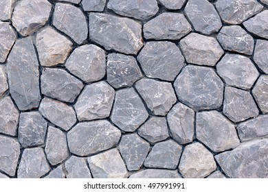 Closeup Embed Stone Pattern In Concrete Wall