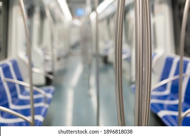 Closeup Of Empty Blue Chairs In Subway Train During Forced Quarantine Measures In Context Of COVID 19 Pandemic