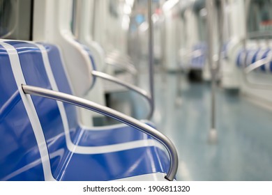 Closeup Of Empty Blue Chairs In Subway Train During Forced Quarantine Measures In Context Of COVID 19 Pandemic