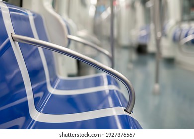 Closeup Of Empty Blue Chairs In Subway Train During Forced Quarantine Measures In Context Of COVID 19 Pandemic