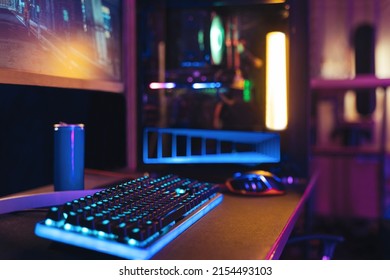 Close-up of empty gaming streaming studio equipped during first person shooter online competition. Professional setup with powerful computer, keyboard, monitor and mouse ready for online championship  - Shutterstock ID 2154493103