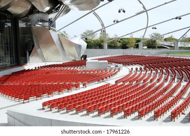 Close-up of empty red chairs