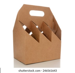 Closeup Of An Empty Six Pack Carrier. The Cardboard Carrier Is Blank And Isolated On White With Reflection.