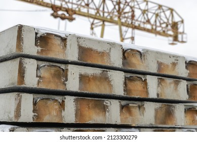 Close-up Of The End Face Of Reinforced Concrete Airfield Slabs Stored In The Warehouse Of The Precast Concrete Factory