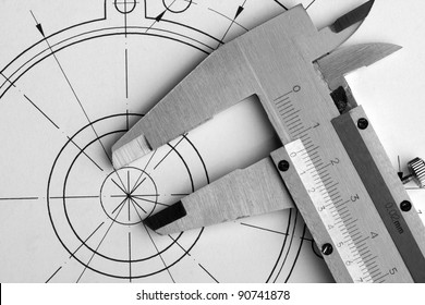 Close-up of engineering drawing and caliper - Shutterstock ID 90741878