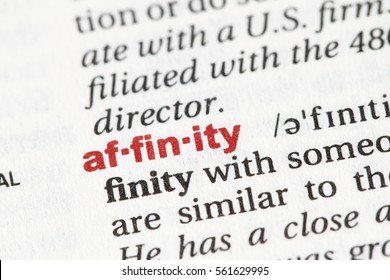 Closeup of English dictionary page with word affinity - Shutterstock ID 561629995