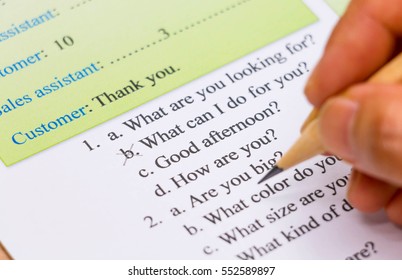 closeup english multiple choice exam sheet about conversation - Shutterstock ID 552589897