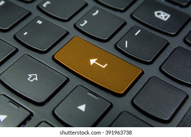 Close-up the Enter symbol and have Orange color button isolate black keyboard