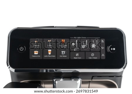 Close-up of espresso machine control panel with touchscreen interface. Multiple beverage options displayed for easy use.