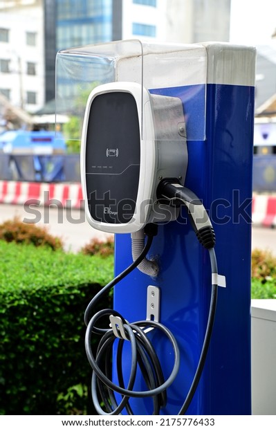 Closeup of EV Charging Station for car battery\
chargers Concept to save fuel, maintain and reduce air pollution\
protect the environment at\
Thailand.