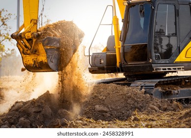 Close-up of excavator at construction site. Backhoe digging soil for earthwork and construction business. Excavating machine at work. Heavy machinery for earth moving and construction site development