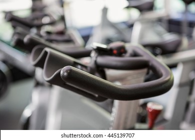 Close-up of exercise bike handlebar in spinning class - Powered by Shutterstock