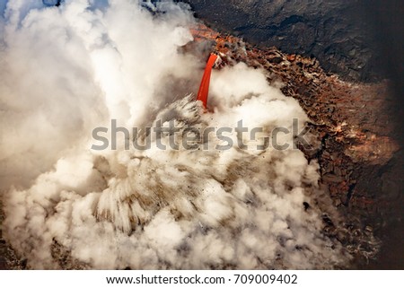 Closeup of Explosive firehose lava flow into ocean on coast of hawaii