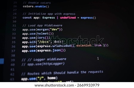 Close-up of Express.js middleware setup in JavaScript backend, showing secure configuration using Helmet, CORS, Morgan, and body parsers for API development.