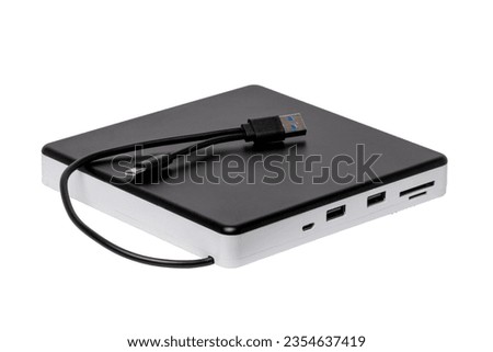 Closeup of a external DVD CD usb burner drive and player with integrated USB interfaces, SD and TF slot as well as micro connections isolated. Computer accessories.