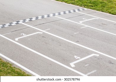 Closeup Of F1 Race Start Line Background In A Car Track In Karting Circuit