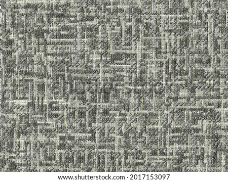 Close-up of the fabric textile texture, background and wallpaper. The texture of fabric textile upholstery of furniture. High-quality photography.
