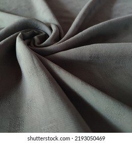 Closeup Fabric Texture Shaped Like A Tornado Symbol