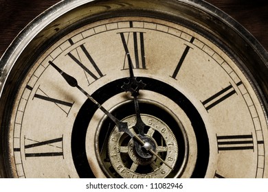 Close-up Of The Face Of An Antique Grandfather Clock Built In 1879 - About To Strike 12 Midnight