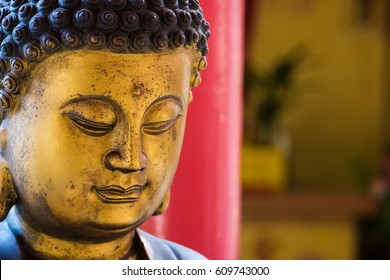 Closeup face of Buddha statue in Chinese style