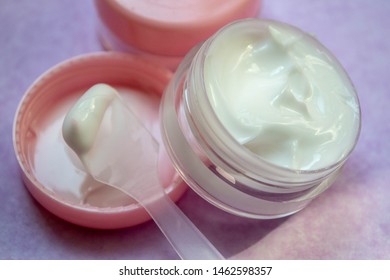 
Closeup Face Cream Sampler In A Pink Jar