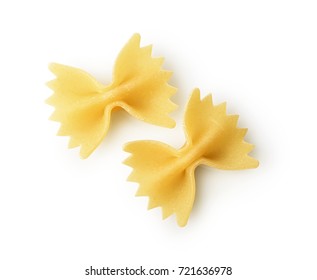 Close-up farfalle. Traditional shape of dry uncooked whole wheat Italian pasta isolated on white background - Powered by Shutterstock