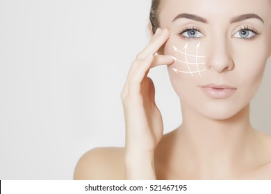 Closeup of female adult with marks on skin for cosmetic medical procedures
