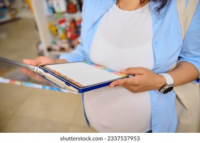 Close-up female artist holding metal case with stylish pastel spectrum color pencils. Drawing and painting activity. Buying school supplies for the start of the new academic school year. People. Hobby - Powered by Shutterstock