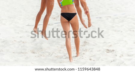 Close-up Female beach volleyball players on sand