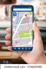 Closeup Of Female Driver Using Cell Phone With Gps Navigation App On The Screen, Woman Sitting In Car