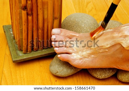 Closeup of a female feet at spa salon on pedicure