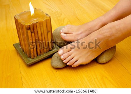 Closeup of a female feet at spa salon on pedicure 