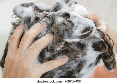 Close-up Of Female Hair In Shampoo