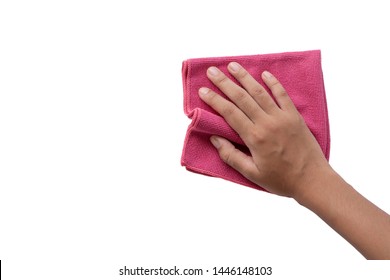 Closeup female hand holding pink duster microfiber cloth for cleaning isolated on white background with clipping path.