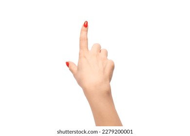 Closeup of female hand with pale skin and red nails pointing or touching isolated on a white background. 