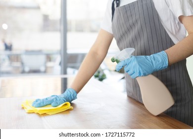 Closeup Of Female Hands In Rubber Gloves Cleaning The Table Before Work On Kitchen, Eco Quarantine Cleaning