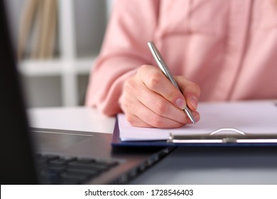 Closeup, Female Hands Taking Notes With Pen Office. Experience That Can Be Presented After Graduation. Employee Learns And Adjusts His Actions. Girl Intern Performs All Tasks At Home