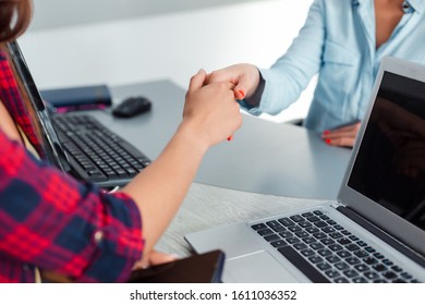 Closeup Female Handshake. Conclusion Of A Transaction During Business Negotiations