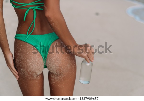 Brown sexy ass Closeup Female Sexy Ass Sandy Hand Stock Photo Edit Now 1337909657