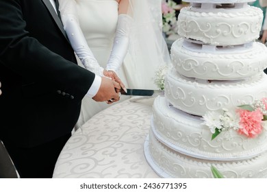 Close-up of figurine couple on wedding cake - Powered by Shutterstock