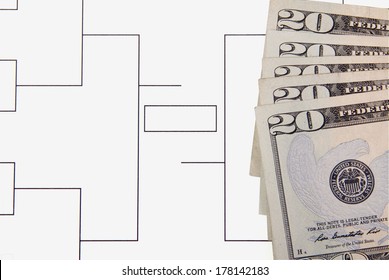 A Closeup Of A Final Four Bracket And Twenty Dollar Bills.