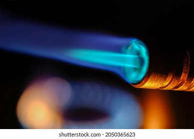 Close-up of fire and flames on a black background, blowtorch closeup of the fire - Powered by Shutterstock