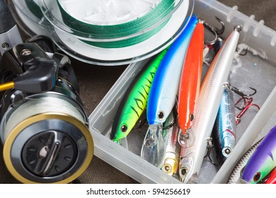 Closeup of a fishing box with colorful lures.