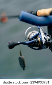 close-up Fishing tackle fishing spinning hooks and baits fisherman on reservoir feeder free style method - Shutterstock ID 2394933931