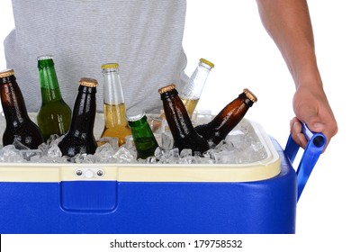 Closeup Of A Fit Young Man Carrying An Ice Chest Full Of Beer. Man Is Wearing A T-shirt Top Showing Torso Only. Horizontal Format Isolated On White.