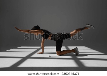 Similar – Image, Stock Photo young caucasian woman doing fitness on mat at home