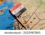 A close-up of the flag of Syria on the map. The capital Damascus. Close-up map of the world. Syria