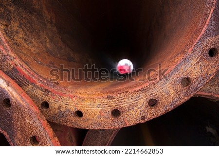 Close-up focus Rusted iron steel metal pipe hole can be used as an industrial texture background